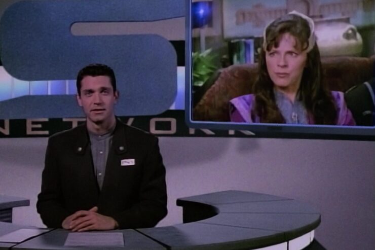 Footage of Delenn appears on an ISN news broadcast with reporter Dan Randall in a scene from Babylon 5: "The Illusion of Truth"